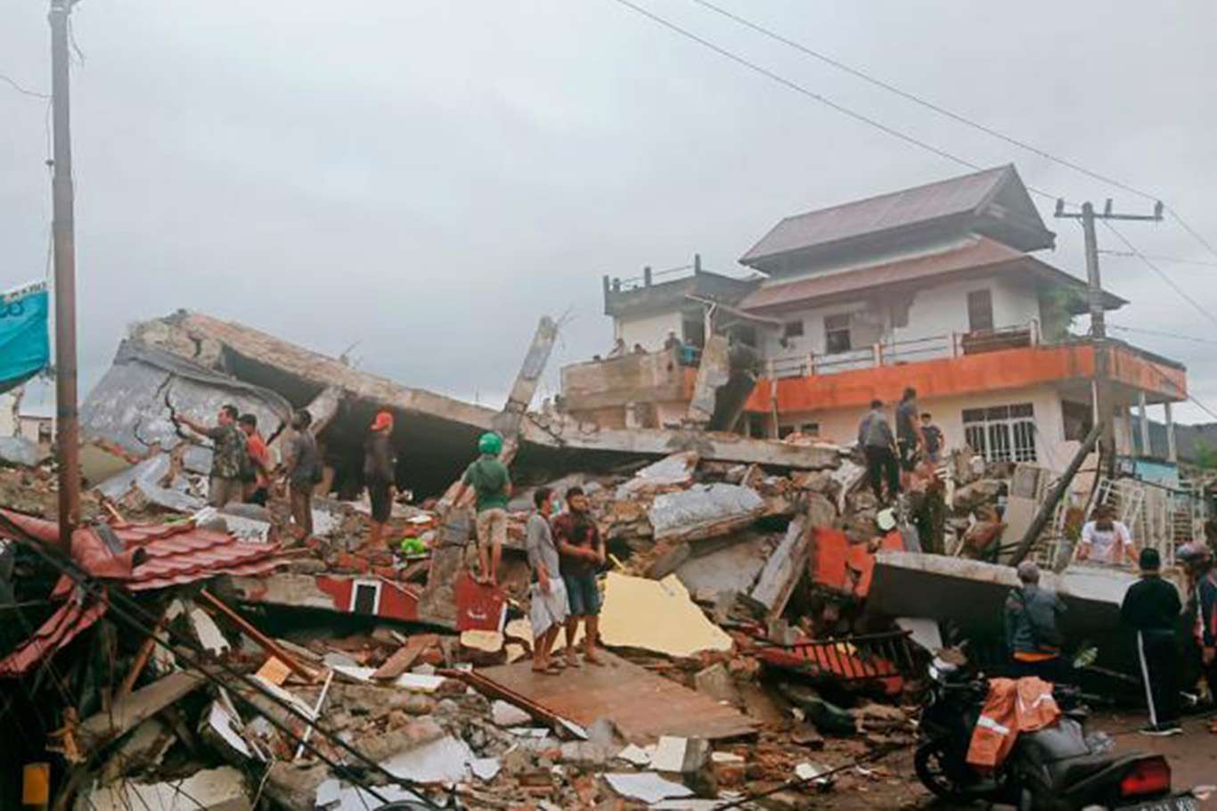 A 6.2 magnitude earthquake kills at least 26 people in Indonesia